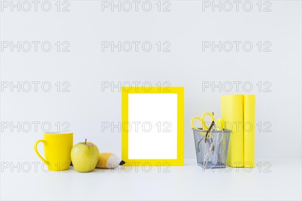 Yellow writing accessories studies white workplace