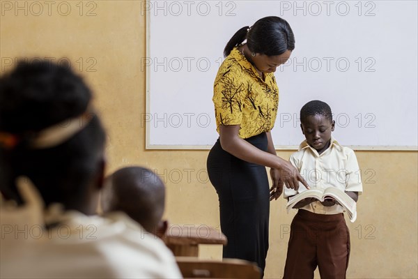 African kids having lesson school