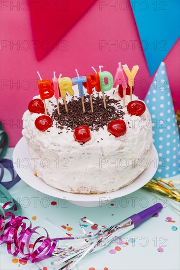 Birthday candles white cake with party decoration