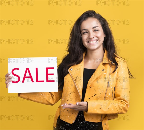 Black friday sale model holding sale banner