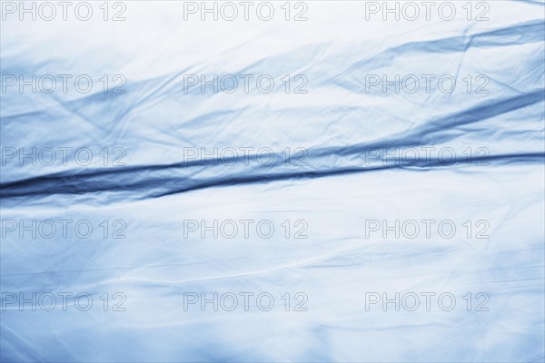 Blue plastic bag texture close up