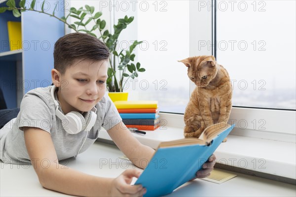 Boy with cat lecture time