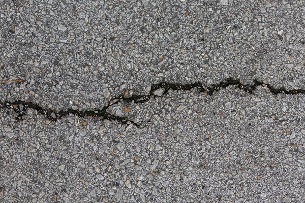 Cement surface with rocks crack