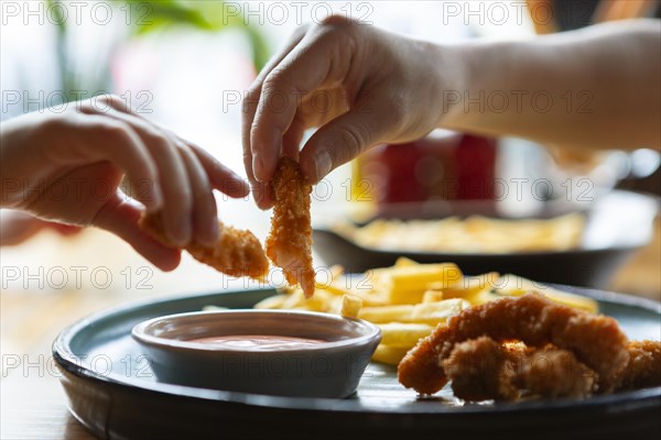 Close up hands holding food