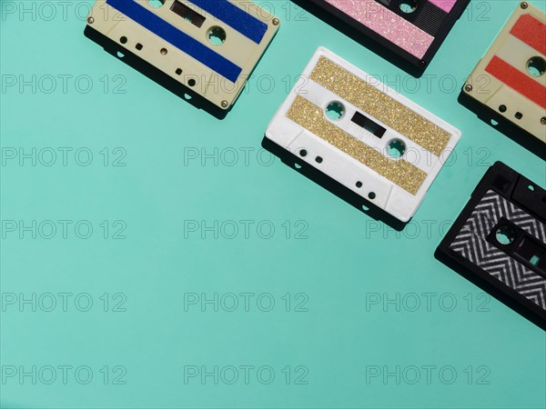 Colorful cassette tapes corner with copy space