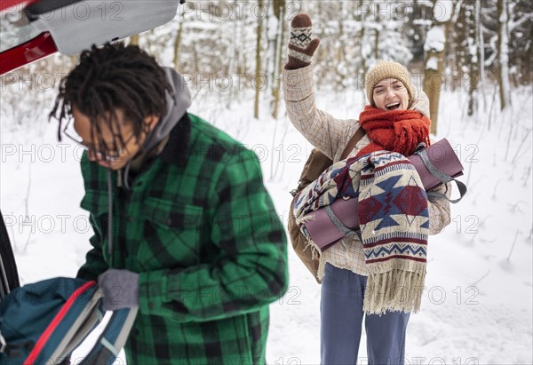 Couple winter time with backpacks