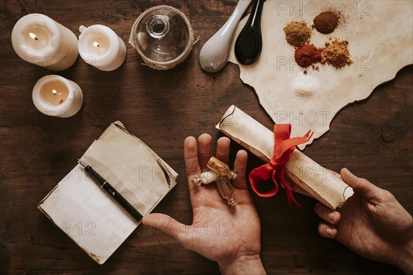 Crop hands with bottles scroll