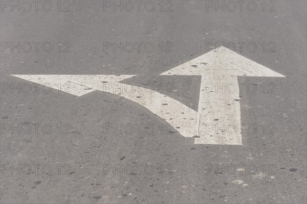 Crossroad arrow lines asphalt