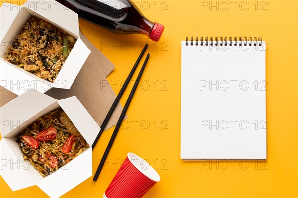 Delicious fast food boxes with clipboard