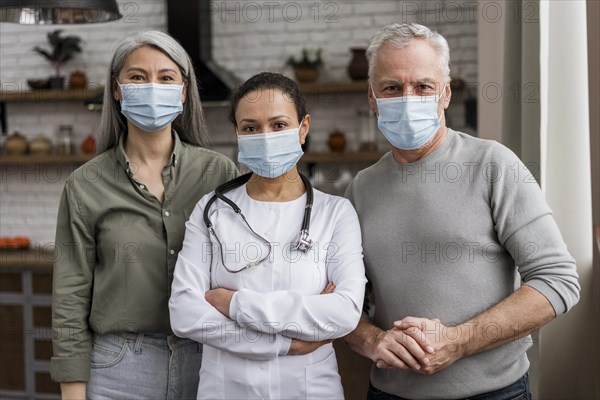 Doctor posing with her patients