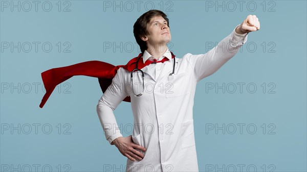 Doctor with cape blue background