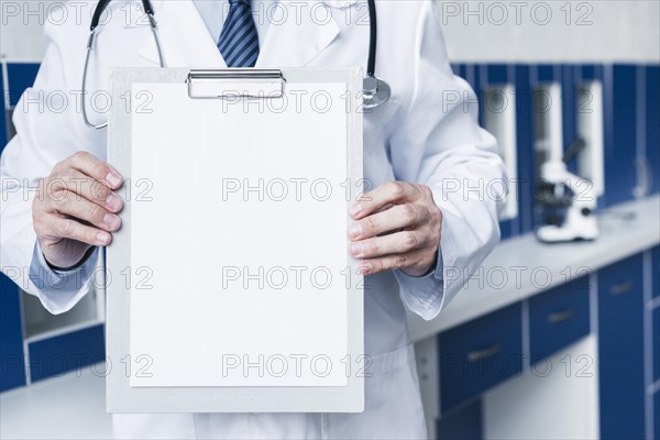 Doctor with medical report
