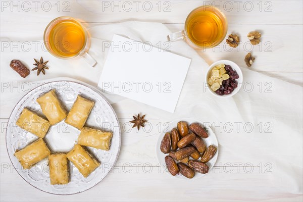 Eastern sweets with dates fruit paper