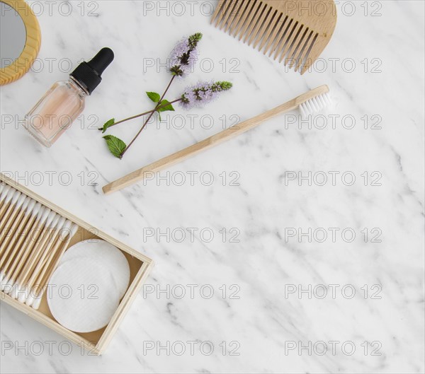 Flat lay cosmetic products frame with copy space