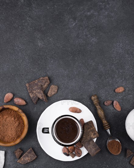 Flat lay cup hot chocolate with copy space