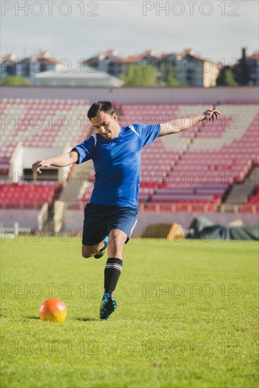 Football player shooting kick