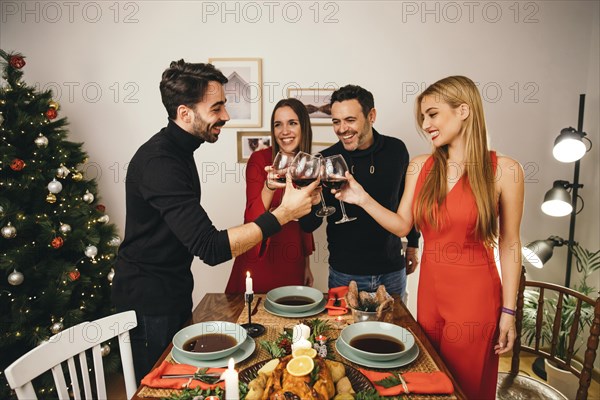 Four friends dining christmas