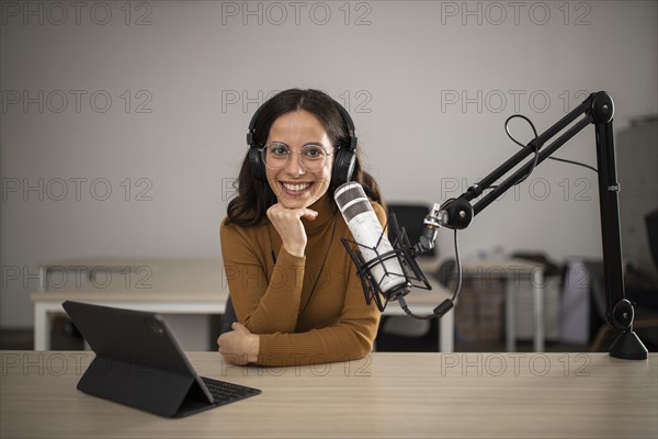 Front view woman broadcasting radio