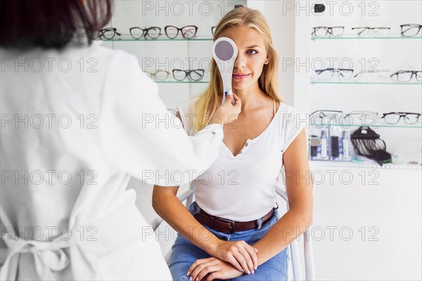 Front view woman during eye exam