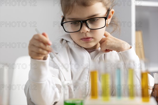 Girl doing experiments laboratory