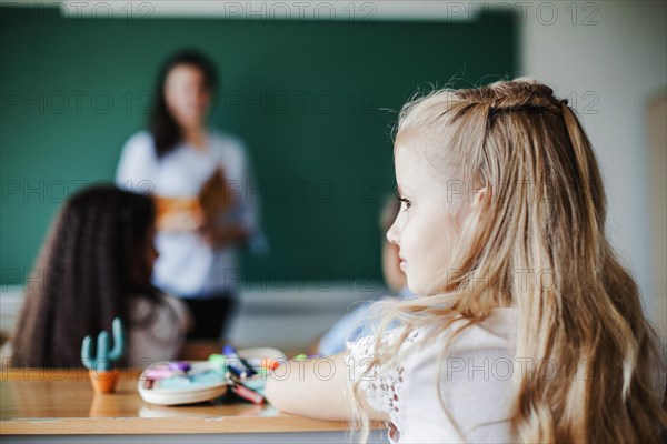 Girl sitting classroom