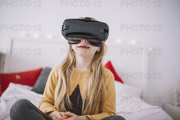 Girl vr goggles bed