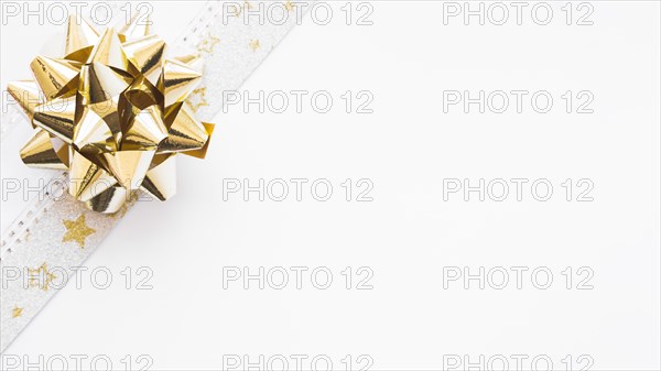 Golden satin ribbon white background