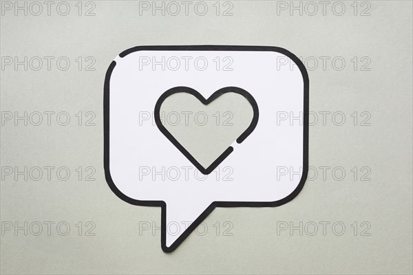Heart bubble speech icon table