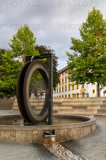 Mill wheel fountain in front of the residence