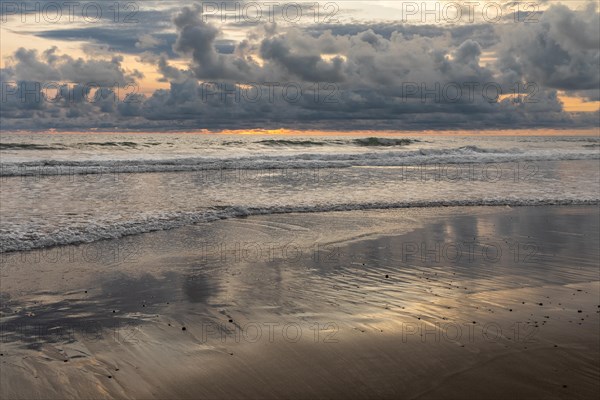 Sunset on sandy beach