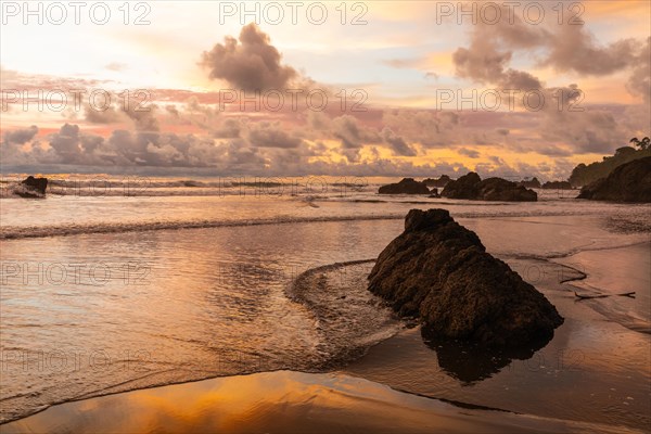 Sunset on sandy beach