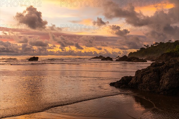 Sunset on sandy beach