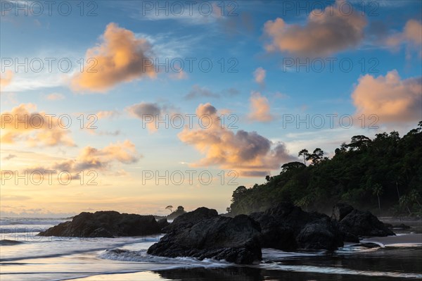 Sunset on sandy beach