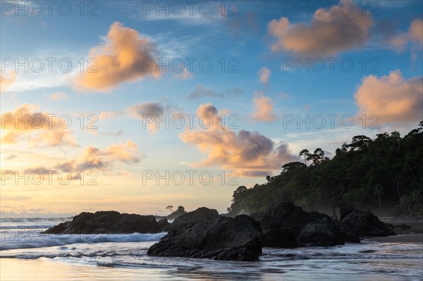 Sunset on sandy beach