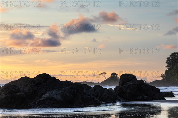 Sunset on sandy beach