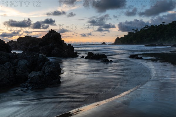 Sunset on sandy beach