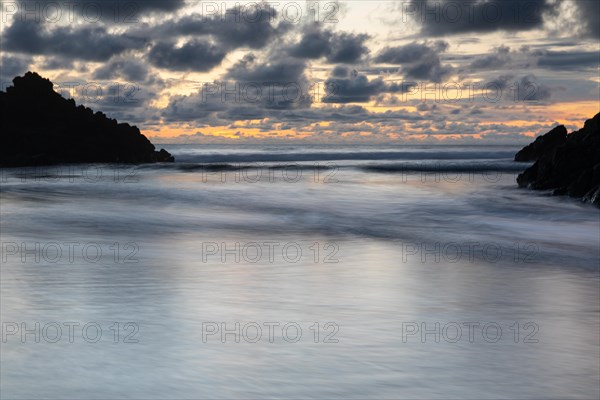 Sunset on sandy beach