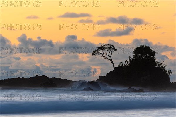 Sunset on sandy beach