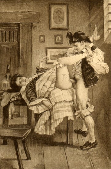 Man and woman having sex on a table