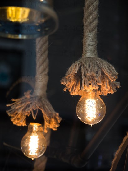 Decorative antique edison style filament light bulbs hanging