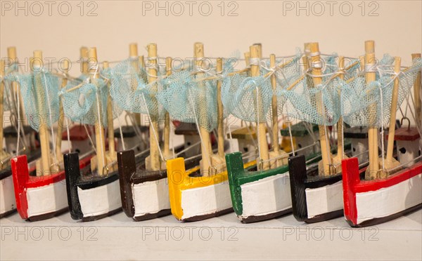 Set of small colorful wooden model boats