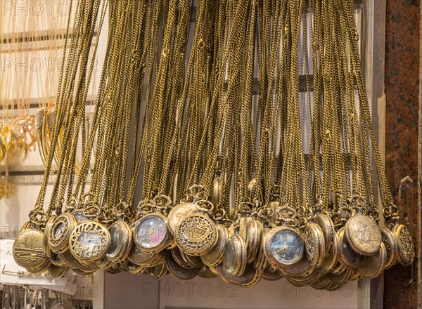 Set of retro styled pocket watches hanging