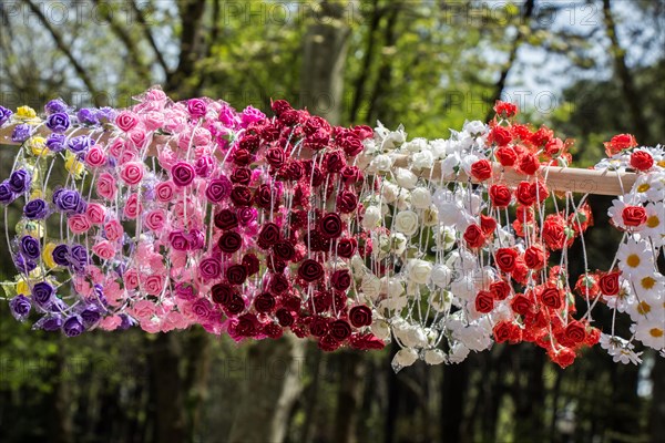 Head crown made of beautiful fake flowers wreath