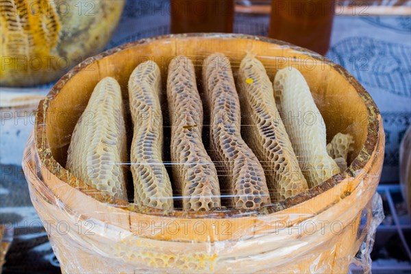 Sweet fresh honey in the sealed comb frame