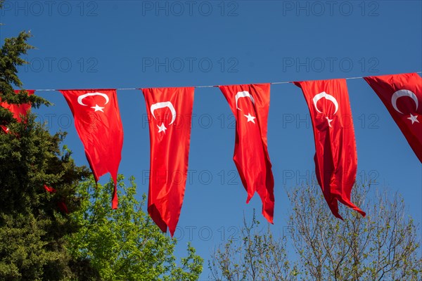 Turkish national flag hang in view in open air