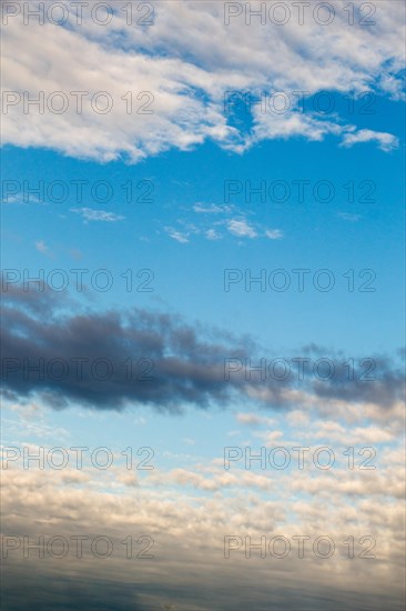 White color clouds found in the blue sky background