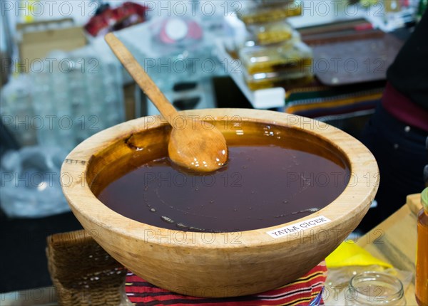 Fresh natural yellow honey in liquid form