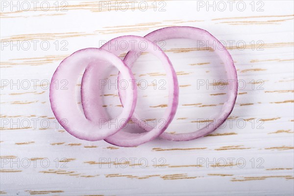 Sliced onion rings and onion slices on the background