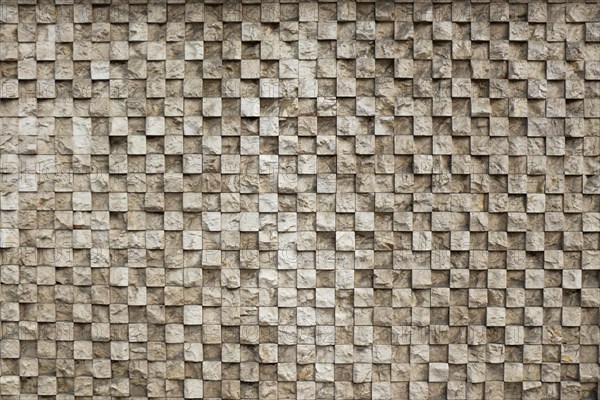 Wall made of the same type and same color of stones