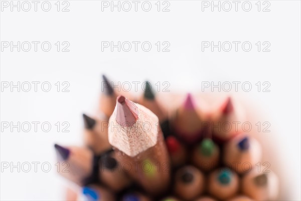 Color pencils of various colors on a white background